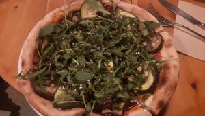 Pizza with loads of rocket! at VEGA - Luna in Madrid