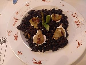 Black rice with ***calamari*** at VEGA - Luna in Madrid