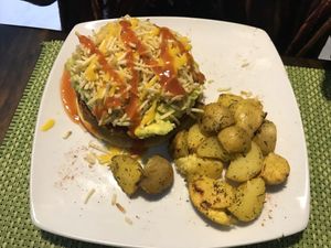 The arepa burger from the menu   at Rushi Comida Sana in Manizales