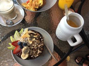 Classic acai bowl + mango smoothie (both made vegan aka no honey) at Cafe One 3 in Whitsunday