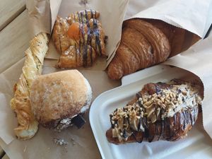 Cheese stick $5.00, Apricot danish $7.00, Plain croissant $6.00, Peanut croissant $8.00, Cappuccino donut $7.00 at Tart Bakery - Grey Lynn in Auckland
