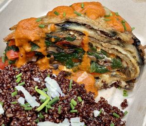 Veg Out - eggplant veggie pie with roasted red pepper coulis and garlicky red quinoa at The Clean Plate Kitchen in Clinton