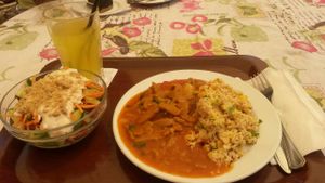 Seitan stew with Hungarian spices, couscous, fresh salade and home made lemonade at Edeni Vegan in Budapest