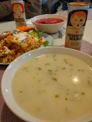 Couliflower soup and cabbage plate with tofu sausage at Edeni Vegan in Budapest