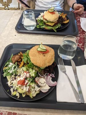 Vegan Burger Plate. Delicious but too much and the bread was a bit hard to chew at Edeni Vegan in Budapest