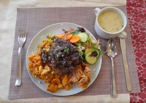 Mixed plate with parsley soup at Edeni Vegan in Budapest