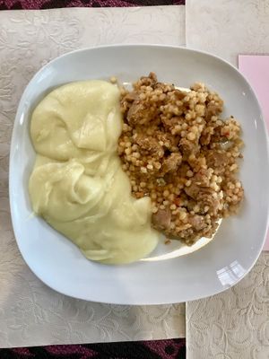 Mashed potatoes and bulgar wheat with seitan (might’ve cost around €12?) at Edeni Vegan in Budapest