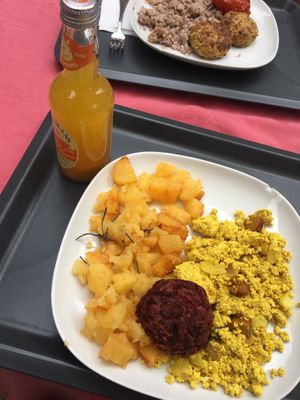 baked potatoes, tofu scramble and a beetroot patty   at Edeni Vegan in Budapest
