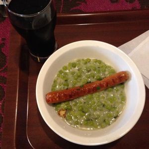 peas dish with coconut milk and soy sausage  at Edeni Vegan in Budapest