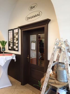Entrance to the Bar and a big seating area at Gasthaus Kappl in Biberbach