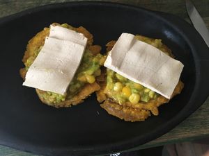 Traditional banana dish with a lovely topping at Nativa in Bogota