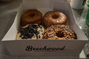 Cronut, lemon poppy seed, caramel chocolate crunch, and cookies 'n cream. YUM. at Beechwood Doughnuts in St Catharines