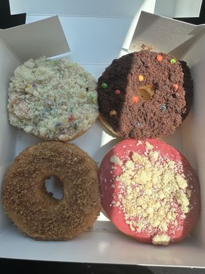 From top left clockwise: birthday cake, cosmic brownie, wild berry pie, French toastt  at Beechwood Doughnuts in St Catharines