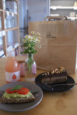 Avo on raw bruschetta, raw banoffee cake, juice and extra treats for later! at The Raw Kitchen in Auckland