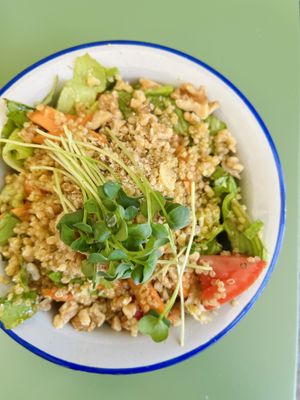 Quinoa salad (tapa) with carrot, cucumber, tomato, lettuce and pine nuts in a (too oily for me) dressing 🌱  at Astrid in Malaga