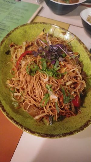 Homemade seitan with noodles and vegetables at Astrid in Malaga