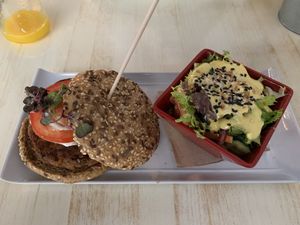 vegan burger orange juice at Astrid in Malaga