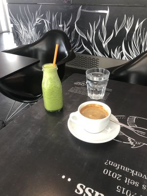 Green ginger smoothie, coffee with oat milk  at Blueorange Coffee and Bagel - Alserbachstrasse in Vienna