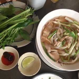 Pho with green stuff to mix in at Saigon Vegan - Bui Vien in Ho Chi Minh City