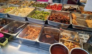 Assorted dishes during lunch peak ~ 11/3/22 at Ci Wen Vegetarian 慈雲素食 in Northeast Singapore