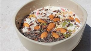 Breakfast Bowl, homemade cashew milk with apple, nuts, seeds, chia seeds, flax, goji berries and cacao nibs at The Yoga Retreat in Koh Phangan