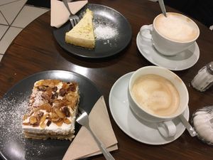 Cake and cafe latte 🥳  at Super Jami Kitchen in Stuttgart