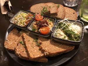 starter: selection of bread with three dips  at Super Jami Kitchen in Stuttgart