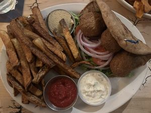 Flafel wrap with fries ❤️ #Veganuary at The Elusive Cow in Bellevue