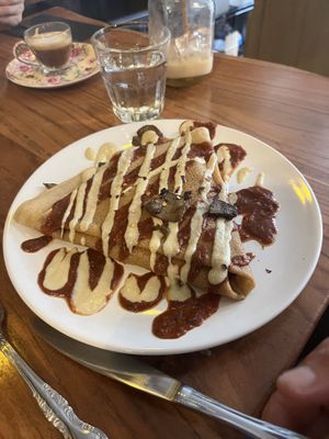 Pizza crepe with caramelized onions and mushrooms   at Little ChoC Apothecary in Brooklyn