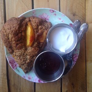 Scone with coconut yogurt and strawberry jam at Little ChoC Apothecary in Brooklyn