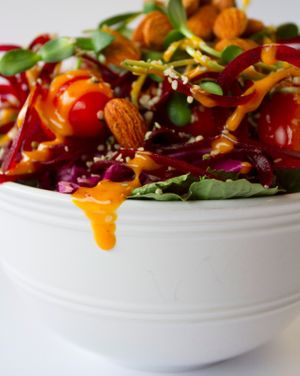 Come try our CO High salad - heaping with veggies, sprouts, almonds and more! You'll fall in love with our Goji Berry dressing too! at Earth Girls Goodies & Eatery in Durango