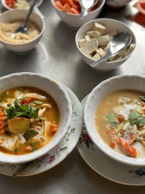 Tom yum soup and Tom yum coconut soup   at Green Garden & May Kaidee Cooking School in Bangkok