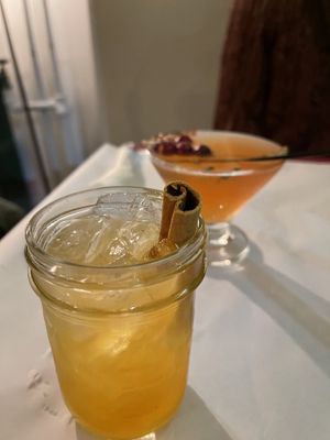 Apple moonshine and behind is the cosmic cosmo. Both vegan and delicious !   at Stone Row Pub and Eatery in Jim Thorpe