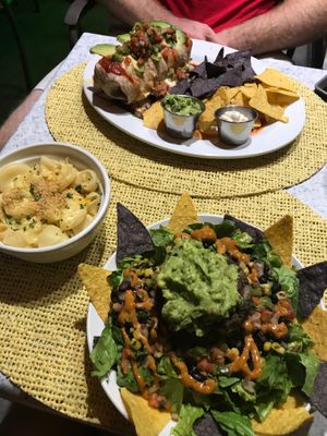 Nachos and the MUST HAVE Mac n cheeze!  at Violette's Vegan Organic Cafe and Juice Bar in Las Vegas