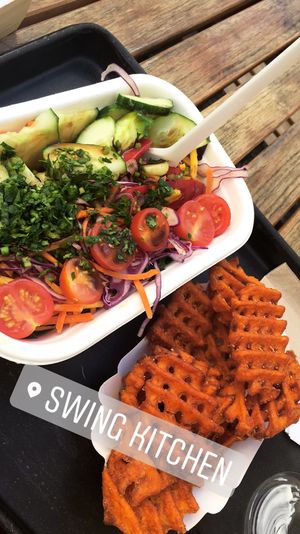 Garden salad and sweet potato fries   at Swing Kitchen - Schottenfeldgasse in Vienna