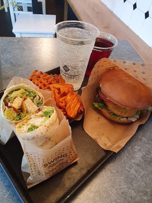 Wrap, burger and sweet potatoe fries at Swing Kitchen - Schottenfeldgasse in Vienna