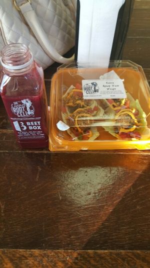 beet box juice and spicy tacos :) at The Living Root Cellar in Riverside
