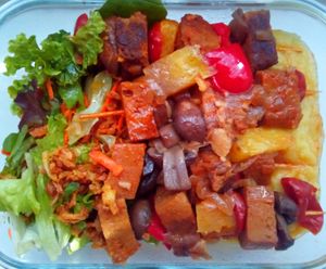 Seitan sticks with mashed sweet potato and quinoa at Sociedade Portuguesa de Naturalogia in Lisbon