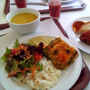 Like lasagna but with Broa crumbs on top (bread) at Sociedade Portuguesa de Naturalogia in Lisbon