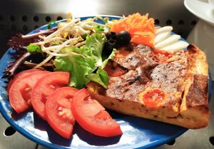 Quiche dish at Sociedade Portuguesa de Naturalogia in Lisbon