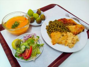 Carrot and peppermint soup, green peas, mashed potatoes mimicking traditional Portuguese dish, pastry with veggies, salad and figs at Sociedade Portuguesa de Naturalogia in Lisbon