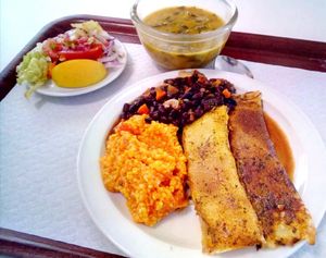 Black beans, noodles and vegan rolls at Sociedade Portuguesa de Naturalogia in Lisbon