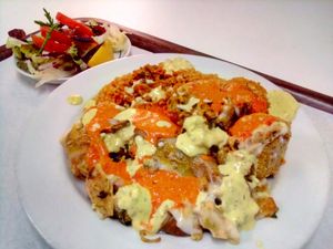 Oats and veggie pastries with vegan sauces at Sociedade Portuguesa de Naturalogia in Lisbon