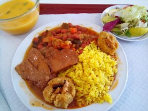 Seitan "bife" with saffron rice, beans & veggies and nuts cakes at Sociedade Portuguesa de Naturalogia in Lisbon