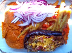 Mash chickpeas, eggplant with veggies, purple onion and fried green beans at Sociedade Portuguesa de Naturalogia in Lisbon