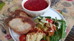 beetroot soup with salad and hummus at Femtopia in Stockholm