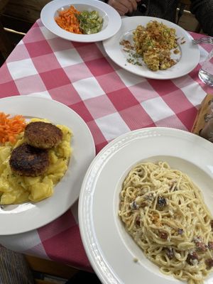 Front: potato salad, oat patties, carbonara; Back: Mac’n’Cheese  at Kaiserhuettn in Bonn
