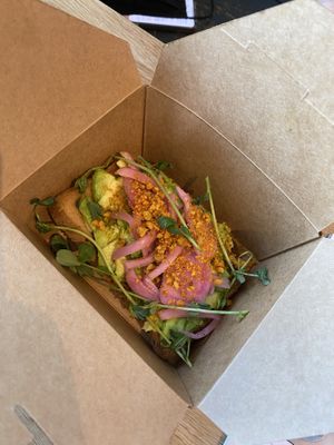 Loaded Avocado Toast
Smashed avocado, pickled onions, spiced walnuts, cilantro oil, and Kravey Garden Pea Shoots
*** with gluten-free bread at Southern Roots Filling Station in Jacksonville