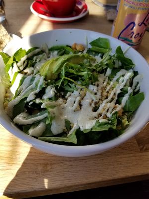 Protein bowl with greens at Southern Roots Filling Station in Jacksonville