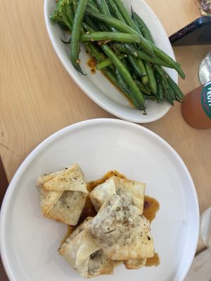 Peanut chilli greens and smoked mushroom wanton   at The Shack in Raglan